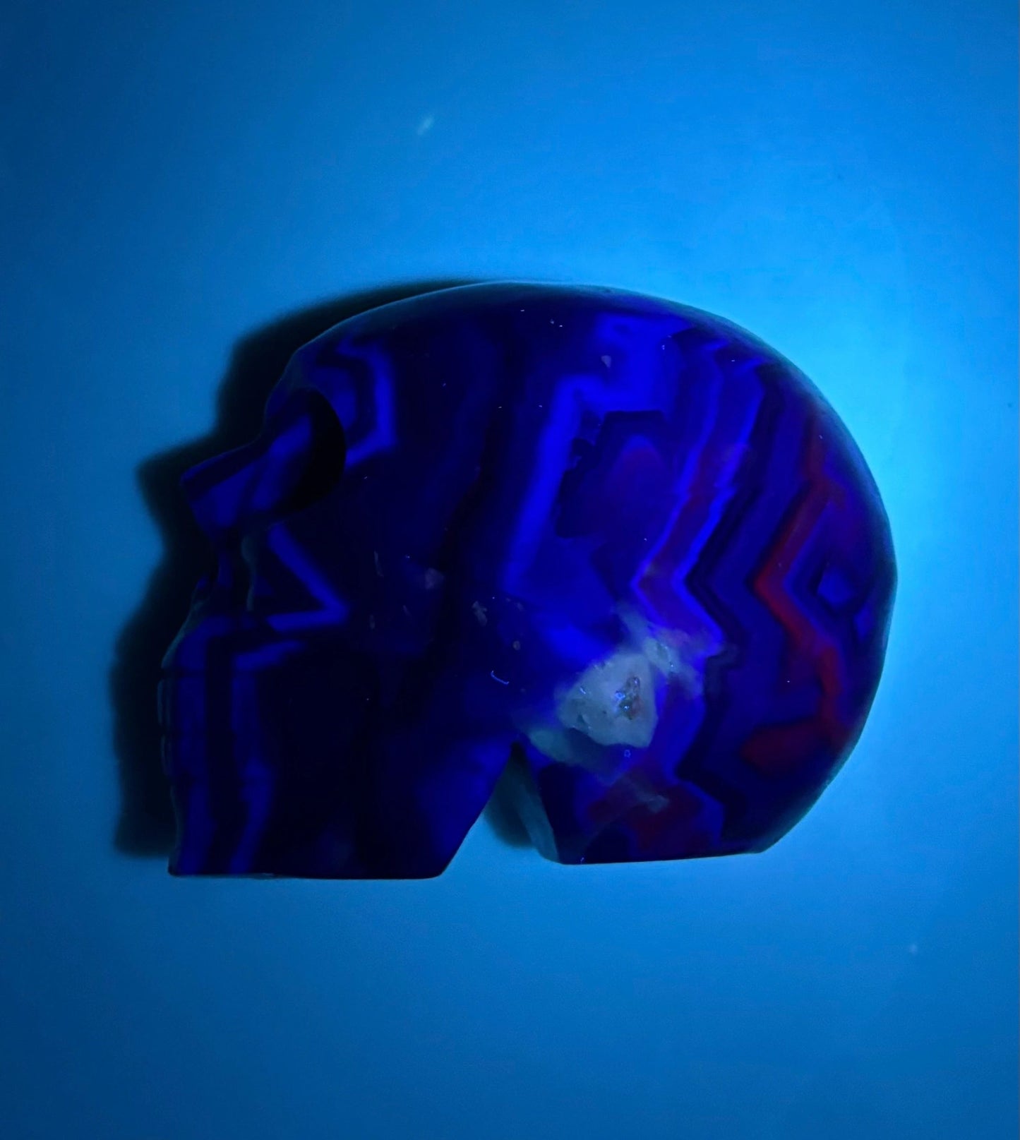 Rainbow Fluorite Fluorescent UV Carved Crystal Skull – Focus, Intuition, Aura Cleanse