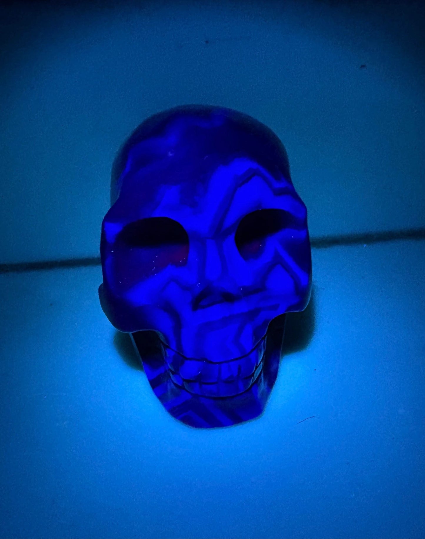 Rainbow Fluorite Fluorescent UV Carved Crystal Skull – Focus, Intuition, Aura Cleanse